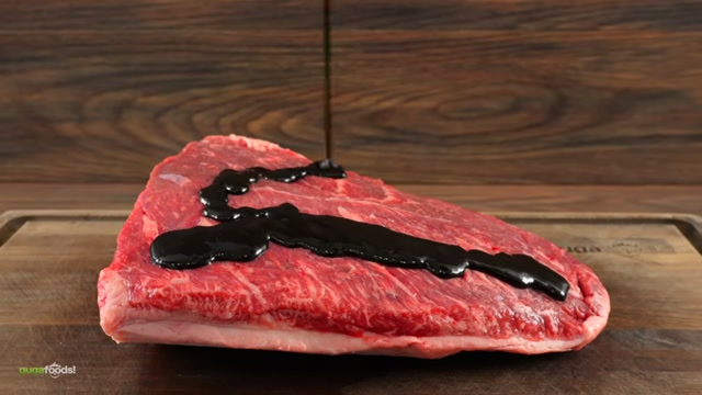 Coating the picanha with hoisin sauce