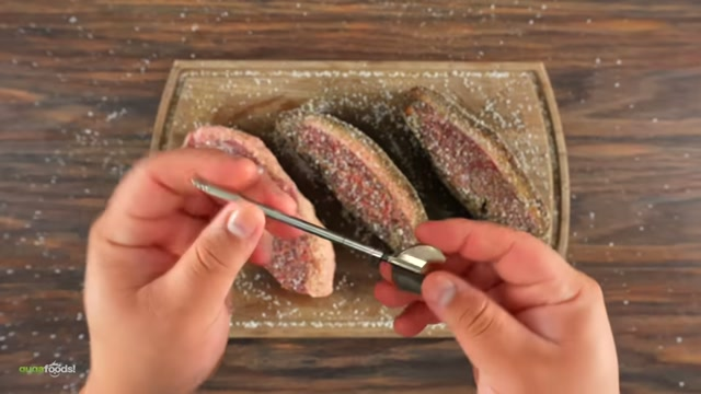 Grilling the hoisin-marinated steaks