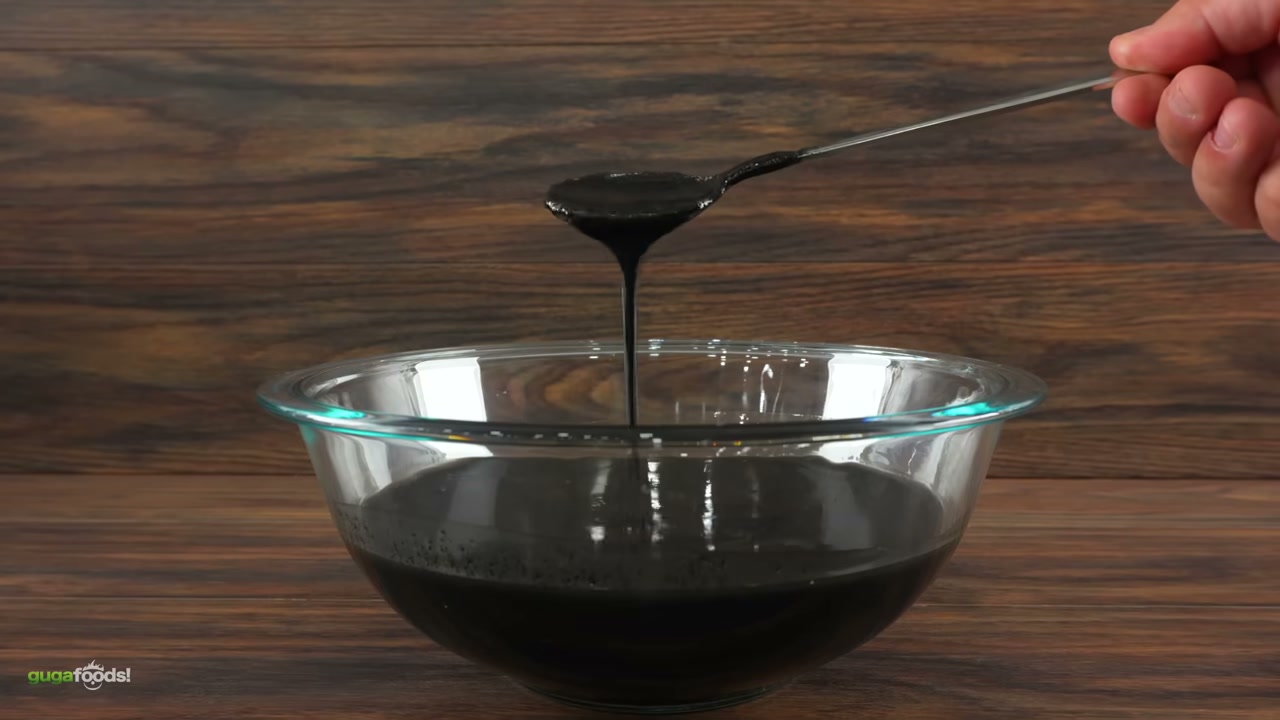 The jet black blend being made - visually striking ingredient reveal that looks 