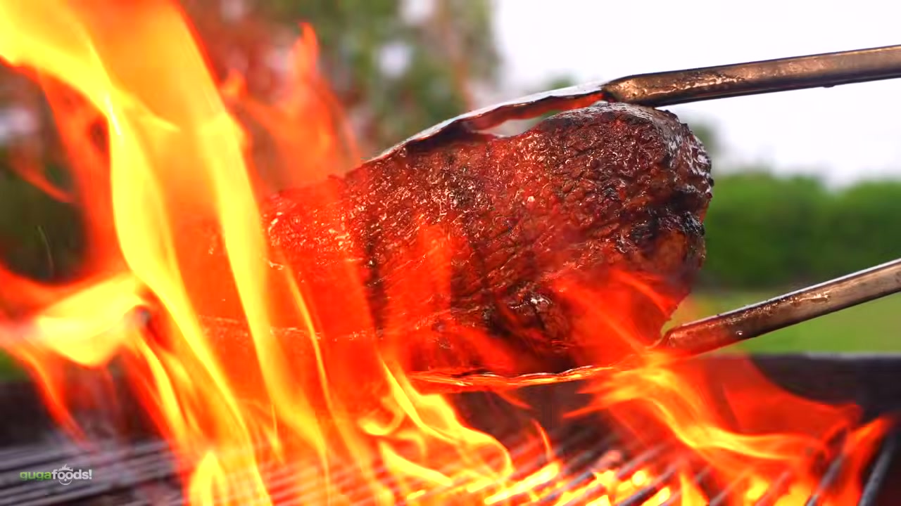 Completed picanha bowl with vibrant kimchi fried rice, soy eggs, and caramelized