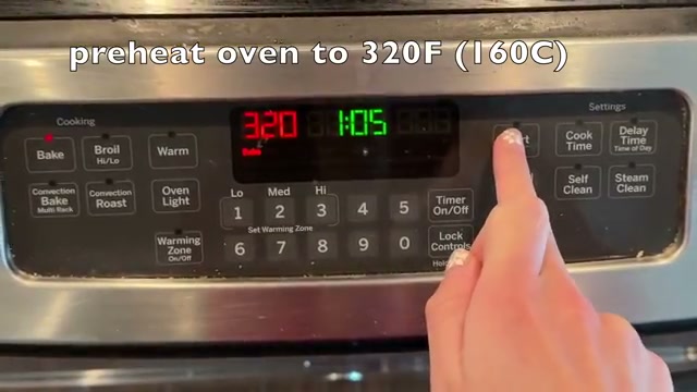 Ingredient spread with eggs, cream cheese, and butter in the mixing bowl