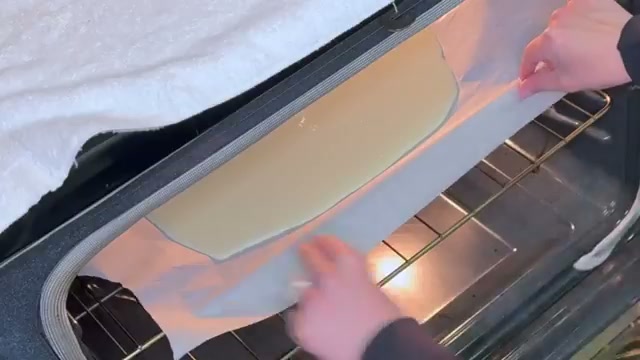 Flatbread coming out of the oven, fully baked and golden