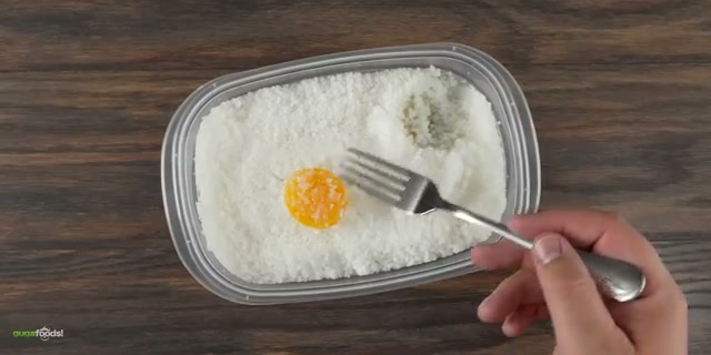 Cured egg yolks revealed after 7 days, showing the transformation