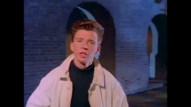 First clear shot of Rick singing, the face-voice mismatch moment that defined hi